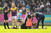 26 April 2025; Wexford manager Keith Rossiter comes onto the field to check on the wellbeing of Lee Chin during the Leinster GAA Hurling Senior Championship Round 2 match between Dublin and Wexford at Parnell Park in Dublin. Photo by David Fitzgerald/Sportsfile