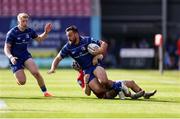 26 April 2025; Ronan Kelleher of Leinster is tackled by Tom Rogers of Scarlets during the United Rugby Championship match between Scarlets and Leinster at Parc Y Scarlets in Swansea, Wales. Photo by Chris Fairweather/Sportsfile
