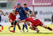 26 April 2025; Will Connors of Leinster is tackled by Taine Plumtree of Scarlets during the United Rugby Championship match between Scarlets and Leinster at Parc Y Scarlets in Swansea, Wales. Photo by Chris Fairweather/Sportsfile