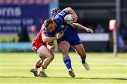 26 April 2025; Ronan Kelleher of Leinster is tackled by Tom Rogers of Scarlets during the United Rugby Championship match between Scarlets and Leinster at Parc Y Scarlets in Swansea, Wales. Photo by Chris Fairweather/Sportsfile