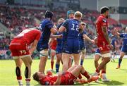 26 April 2025; Jamie Osborne of Leinster celebrates with team mates after scoring his side's first try during the United Rugby Championship match between Scarlets and Leinster at Parc Y Scarlets in Swansea, Wales. Photo by Chris Fairweather/Sportsfile