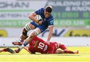 26 April 2025; James Culhane of Leinster is tackled by Sam Costelow of Scarlets during the United Rugby Championship match between Scarlets and Leinster at Parc Y Scarlets in Swansea, Wales. Photo by Chris Fairweather/Sportsfile