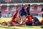 26 April 2025; Diarmuid Mangan of Leinster celebrates scoring a try with team mates during the United Rugby Championship match between Scarlets and Leinster at Parc Y Scarlets in Swansea, Wales. Photo by Chris Fairweather/Sportsfile