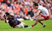 26 April 2025; Armagh goalkeeper Ethan Rafferty in action against Darragh Canavan of Tyrone during the Ulster GAA Football Senior Championship semi-final match between Armagh and Tyrone at St Tiernach's Park in Clones, Monaghan. Photo by Seb Daly/Sportsfile