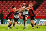26 April 2025; Bronson Mills of Emirates Lions and JC Pretorius of Emirates Lions tackle Paul Boyle of Connacht during the United Rugby Championship match between Emirates Lions and Connacht at Emirates Airline Park in Johannesburg, South Africa. Photo by Shaun Roy/Sportsfile