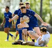 26 April 2025; Walter Walsh of Leinster goes past the tackle of Michael Orr of Ulster during the Junior Interprovincial Rugby Championship round one match between Leinster and Ulster at Gorey RFC in Gorey, Wexford. Photo by Matt Browne/Sportsfile