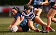 26 April 2025; Lauren Nelson of MU Barnhall and Leah Reilly of Blackrock College contest a loose ball in the Flood Cup Final match between Barnhall NUIM and Blackrock RFC during the Leinster Rugby Girls Finals Day at Mullingar RFC in Mullingar, Westmeath. Photo by Ben McShane/Sportsfile