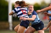 26 April 2025; Nina McVann of Blackrock College is tackled by Katie Counihan of MU Barnhall in the Flood Cup Final match between Barnhall NUIM and Blackrock RFC during the Leinster Rugby Girls Finals Day at Mullingar RFC in Mullingar, Westmeath. Photo by Ben McShane/Sportsfile