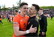 26 April 2025; Armagh players Rory Grugan and Aidan Forker celebrate after their side's victory in the Ulster GAA Football Senior Championship semi-final match between Armagh and Tyrone at St Tiernach's Park in Clones, Monaghan. Photo by Seb Daly/Sportsfile