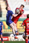 26 April 2025; Jamie Osborne of Leinster and Taine Plumtree of Scarlets go for the ball during the United Rugby Championship match between Scarlets and Leinster at Parc Y Scarlets in Swansea, Wales. Photo by Chris Fairweather/Sportsfile