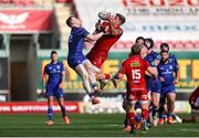 26 April 2025; Jamie Osborne of Leinster and Taine Plumtree of Scarlets go for the ball during the United Rugby Championship match between Scarlets and Leinster at Parc Y Scarlets in Swansea, Wales. Photo by Chris Fairweather/Sportsfile
