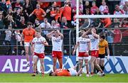 26 April 2025; Tyrone players react after a last minute free is awarded against their side during the Ulster GAA Football Senior Championship semi-final match between Armagh and Tyrone at St Tiernach's Park in Clones, Monaghan. Photo by Seb Daly/Sportsfile