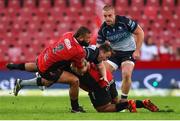 26 April 2025; David Hawkshaw of Connacht is tackled by Jaco Visagie and Asenathi Ntlabakanye of Emirates Lions during the United Rugby Championship match between Emirates Lions and Connacht at Emirates Airline Park in Johannesburg, South Africa. Photo by Shaun Roy/Sportsfile