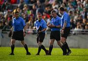 26 April 2025; Referee James Owens, 2nd from right, takes notes as he speaks to his officials at half time the Leinster GAA Hurling Senior Championship Round 2 match between Offaly and Galway at Glenisk O’Connor Park in Tullamore, Offaly. Photo by Ray McManus/Sportsfile