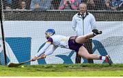 26 April 2025; Wexford goalkeeper Mark Fanning dives for a penalty taken by Sean Currie of Dublin which was awarded as Dublin's third goal during the Leinster GAA Hurling Senior Championship Round 2 match between Dublin and Wexford at Parnell Park in Dublin. Photo by David Fitzgerald/Sportsfile