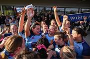 26 April 2025; MU Barnhall captains Aoibhe Curran and Ali McMurray celebrate with the cup and their teammates after the Flood Cup Final match between Barnhall NUIM and Blackrock RFC during the Leinster Rugby Girls Finals Day at Mullingar RFC in Mullingar, Westmeath. Photo by Ben McShane/Sportsfile