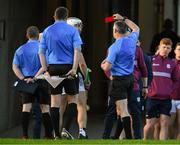 26 April 2025; Referee James Owens issues a red card to Daithí Burke of Galway, hidden left, as Galway manager Micheál Donoghue remonstrates , for which he subsequently received a yellow card, before the start of the second half during the Leinster GAA Hurling Senior Championship Round 2 match between Offaly and Galway at Glenisk O’Connor Park in Tullamore, Offaly. Photo by Ray McManus/Sportsfile