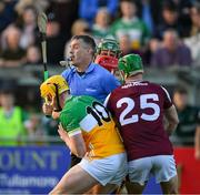 26 April 2025; Referee James Owens tries to make his way between Offaly players, David King and Killian Sampson and Galway players David Burke, 25, and Tom Monaghan to start the second half during the Leinster GAA Hurling Senior Championship Round 2 match between Offaly and Galway at Glenisk O’Connor Park in Tullamore, Offaly. Photo by Ray McManus/Sportsfile