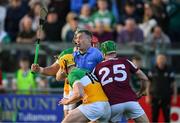 26 April 2025; Referee James Owens tries to make his way between Offaly players, David King and Killian Sampson and Galway players David Burke, 25, and Tom Monaghan to start the second half during the Leinster GAA Hurling Senior Championship Round 2 match between Offaly and Galway at Glenisk O’Connor Park in Tullamore, Offaly. Photo by Ray McManus/Sportsfile