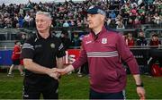 26 April 2025; The two managers, Offaly manager Johnny Kelly, left, and Galway manager Micheál Donoghue, shake hands after the Leinster GAA Hurling Senior Championship Round 2 match between Offaly and Galway at Glenisk O’Connor Park in Tullamore, Offaly. Photo by Ray McManus/Sportsfile