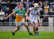 26 April 2025; Galway goalkeeper Darach Fahy clears under pressure from Charlie Mitchell of Offaly during the Leinster GAA Hurling Senior Championship Round 2 match between Offaly and Galway at Glenisk O’Connor Park in Tullamore, Offaly. Photo by Ray McManus/Sportsfile