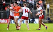 26 April 2025; Michael McKernan of Tyrone, right, celebrates during the Ulster GAA Football Senior Championship semi-final match between Armagh and Tyrone at St Tiernach's Park in Clones, Monaghan. Photo by Seb Daly/Sportsfile
