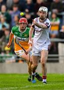 26 April 2025; Galway goalkeeper Darach Fahy clears under pressure from Charlie Mitchell of Offaly during the Leinster GAA Hurling Senior Championship Round 2 match between Offaly and Galway at Glenisk O’Connor Park in Tullamore, Offaly. Photo by Ray McManus/Sportsfile