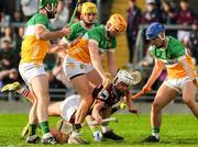 26 April 2025; Colm Molloy of Galway is tackled by Offaly players Ben Conneely, left, Killian Sampson, Ciaran Burke, 3, and James Mahon, right, to conceed a penalty during the Leinster GAA Hurling Senior Championship Round 2 match between Offaly and Galway at Glenisk O’Connor Park in Tullamore, Offaly. Photo by Ray McManus/Sportsfile
