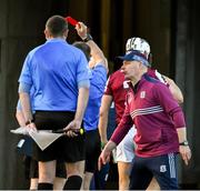 26 April 2025; Galway manager Micheál Donoghue remonstrates with referee James Owens as he issues a red card to Daithí Burke of Galway, white helmet, before starting the second half of the Leinster GAA Hurling Senior Championship Round 2 match between Offaly and Galway at Glenisk O’Connor Park in Tullamore, Offaly. Photo by Ray McManus/Sportsfile