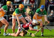 26 April 2025; Colm Molloy of Galway is tackled by Offaly players Killian Sampson,10, Ciaran Burke and James Mahon, right, to conceed a penalty during the Leinster GAA Hurling Senior Championship Round 2 match between Offaly and Galway at Glenisk O’Connor Park in Tullamore, Offaly. Photo by Ray McManus/Sportsfile