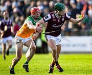 26 April 2025; Gavin Lee of Galway is tackled by Charlie Mitchell of Offaly during the Leinster GAA Hurling Senior Championship Round 2 match between Offaly and Galway at Glenisk O’Connor Park in Tullamore, Offaly. Photo by Ray McManus/Sportsfile