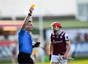 26 April 2025; Referee James Owens holds a yellow card aloft during the Leinster GAA Hurling Senior Championship Round 2 match between Offaly and Galway at Glenisk O’Connor Park in Tullamore, Offaly. Photo by Ray McManus/Sportsfile