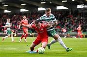 25 April 2025; Danny Grant of Shamrock Rovers in action against Kameron Ledwidge of Shelbourne during the SSE Airtricity Men's Premier Division match between Shamrock Rovers and Shelbourne at Tallaght Stadium in Dublin. Photo by Ramsey Cardy/Sportsfile
