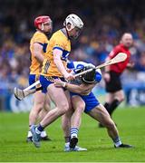 27 April 2025; Adam Hogan of Clare and Kevin Mahony of Waterford tussle off the ball during the Munster GAA Hurling Senior Championship Round 2 match between Waterford and Clare at Walsh Park in Waterford. Photo by Piaras Ó Mídheach/Sportsfile