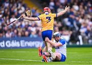 27 April 2025; Stephen Bennett of Waterford and Darragh Lohan of Clare tussle of the ball during the Munster GAA Hurling Senior Championship Round 2 match between Waterford and Clare at Walsh Park in Waterford. Photo by Piaras Ó Mídheach/Sportsfile