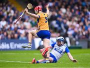 27 April 2025; Stephen Bennett of Waterford and Darragh Lohan of Clare tussle of the ball during the Munster GAA Hurling Senior Championship Round 2 match between Waterford and Clare at Walsh Park in Waterford. Photo by Piaras Ó Mídheach/Sportsfile