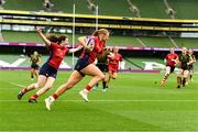 27 April 2025; Laoise McGonagle of UL Bohemian on her way to scoring a try during the Energia All-Ireland League Women's Division 1 final match between Railway Union RFC and UL Bohemian at the Aviva Stadium in Dublin. Photo by Matt Browne/Sportsfile