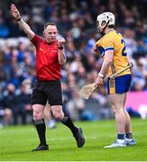 27 April 2025; Referee Chris Mooney awards a free against Adam Hogan of Clare during the Munster GAA Hurling Senior Championship Round 2 match between Waterford and Clare at Walsh Park in Waterford. Photo by Piaras Ó Mídheach/Sportsfile