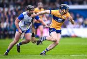 27 April 2025; David McInerney of Clare in action against Kevin Mahoney of Waterford during the Munster GAA Hurling Senior Championship Round 2 match between Waterford and Clare at Walsh Park in Waterford. Photo by Piaras Ó Mídheach/Sportsfile