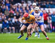 27 April 2025; Darragh Lohan of Clare in action against Dessie Hutchinson of Wateford during the Munster GAA Hurling Senior Championship Round 2 match between Waterford and Clare at Walsh Park in Waterford. Photo by Piaras Ó Mídheach/Sportsfile