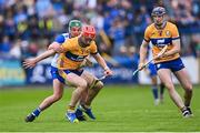 27 April 2025; Darragh Lohan of Clare in action against Jack Prendergast of Waterford during the Munster GAA Hurling Senior Championship Round 2 match between Waterford and Clare at Walsh Park in Waterford. Photo by Piaras Ó Mídheach/Sportsfile