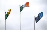 27 April 2025; The Tricolour, the Meath flag, left, and Dublin flag flutter in the strong wind before the Leinster GAA Football Senior Championship semi-final match between Dublin and Meath at Laois Hire O'Moore Park in Portlaoise, Laois. Photo by Ray McManus/Sportsfile