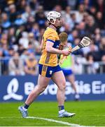 27 April 2025; Adam Hogan of Clare with the broken hurl of Dessie Hutchinson of Waterford during the Munster GAA Hurling Senior Championship Round 2 match between Waterford and Clare at Walsh Park in Waterford. Photo by Piaras Ó Mídheach/Sportsfile