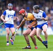 27 April 2025; Peter Duggan of Clare in action against Jamie Barron of Waterford during the Munster GAA Hurling Senior Championship Round 2 match between Waterford and Clare at Walsh Park in Waterford. Photo by Piaras Ó Mídheach/Sportsfile