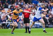 27 April 2025; Kevin Mahony of Waterford shoots under pressure from Darragh Lohan of Clare during the Munster GAA Hurling Senior Championship Round 2 match between Waterford and Clare at Walsh Park in Waterford. Photo by Piaras Ó Mídheach/Sportsfile