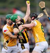 27 April 2025; Martin Keoghan of Kilkenny in action against Antrim players Stephen Rooney, left, and Joe Maskey during the Leinster GAA Hurling Senior Championship Round 2 match between Antrim and Kilkenny at Corrigan Park in Belfast. Photo by Thomas Flinkow/Sportsfile