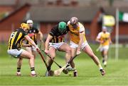27 April 2025; Eoghan Campbell of Antrim in action against Kilkenny players Richie Reid, left, and Tommy Walsh during the Leinster GAA Hurling Senior Championship Round 2 match between Antrim and Kilkenny at Corrigan Park in Belfast. Photo by Thomas Flinkow/Sportsfile