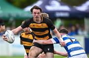27 April 2025; Sean Quinlan of County Carlow is tackled by David Downey of Athy during the Bank of Ireland Provincial Towns Cup final match between Athy RFC and County Carlow FC at Forenaughts in Naas, Kildare. Photo by Seb Daly/Sportsfile