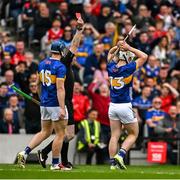 27 April 2025; Darragh McCarthy of Tipperary, 13, is shown a red card by referee Johnny Murphy during the Munster GAA Hurling Senior Championship Round 2 match between Cork and Tipperary at SuperValu Páirc Uí Chaoimh in Cork. Photo by Brendan Moran/Sportsfile