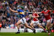 27 April 2025; Sam O'Farrell of Tipperary is tackled by Darragh Fitzgibbon of Cork during the Munster GAA Hurling Senior Championship Round 2 match between Cork and Tipperary at SuperValu Páirc Uí Chaoimh in Cork. Photo by Brendan Moran/Sportsfile